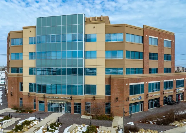 Modern multi-story office building in winter