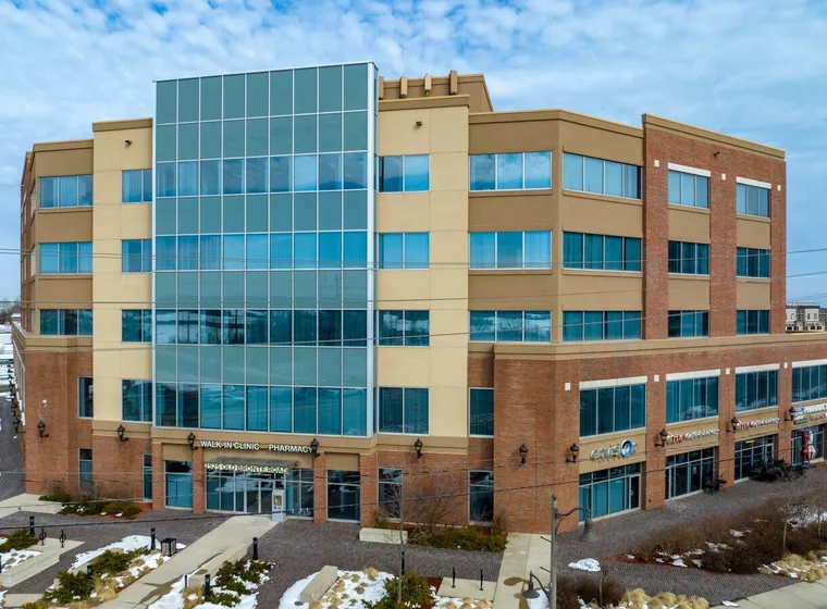 Modern multi-story office building in winter