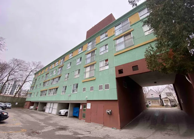 Colorful apartment building with underpass parking