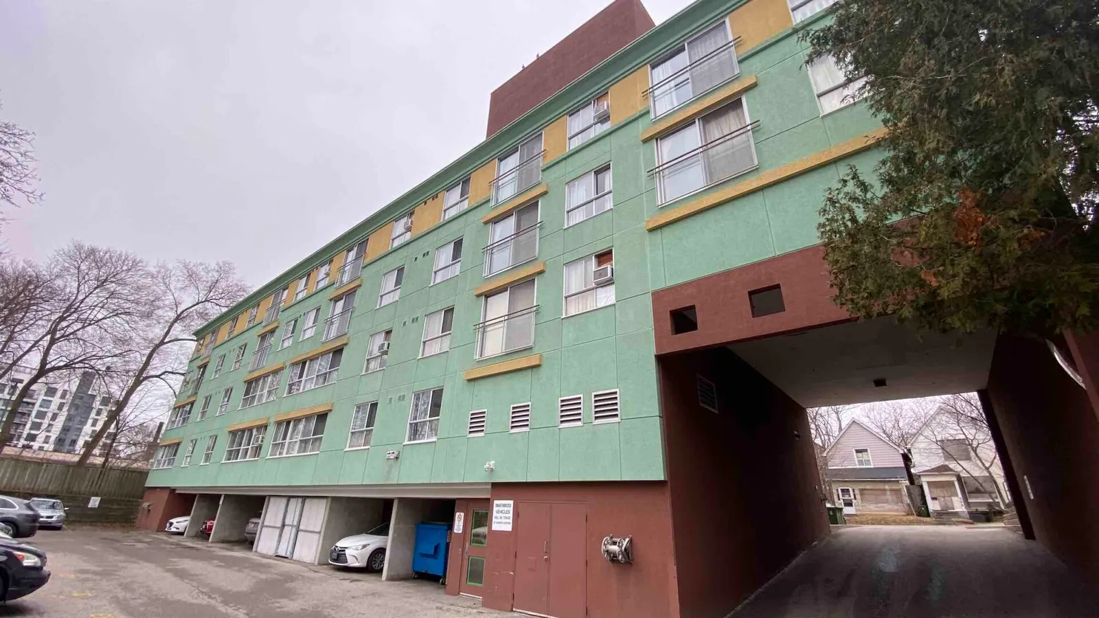 Colorful apartment building with underpass parking