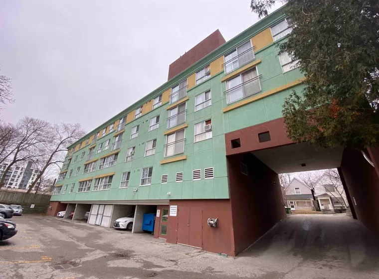 Colorful apartment building with underpass parking