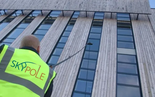 You can see how much safer it is to clean windows from the ground.