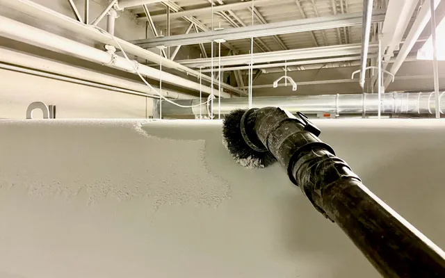 A vacuum collecting high dust from pipes and fans.