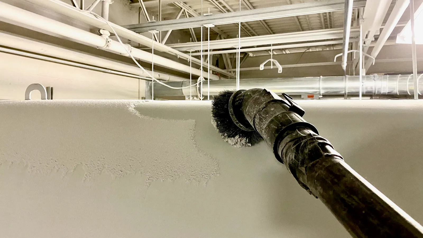 A vacuum collecting high dust from pipes and fans.