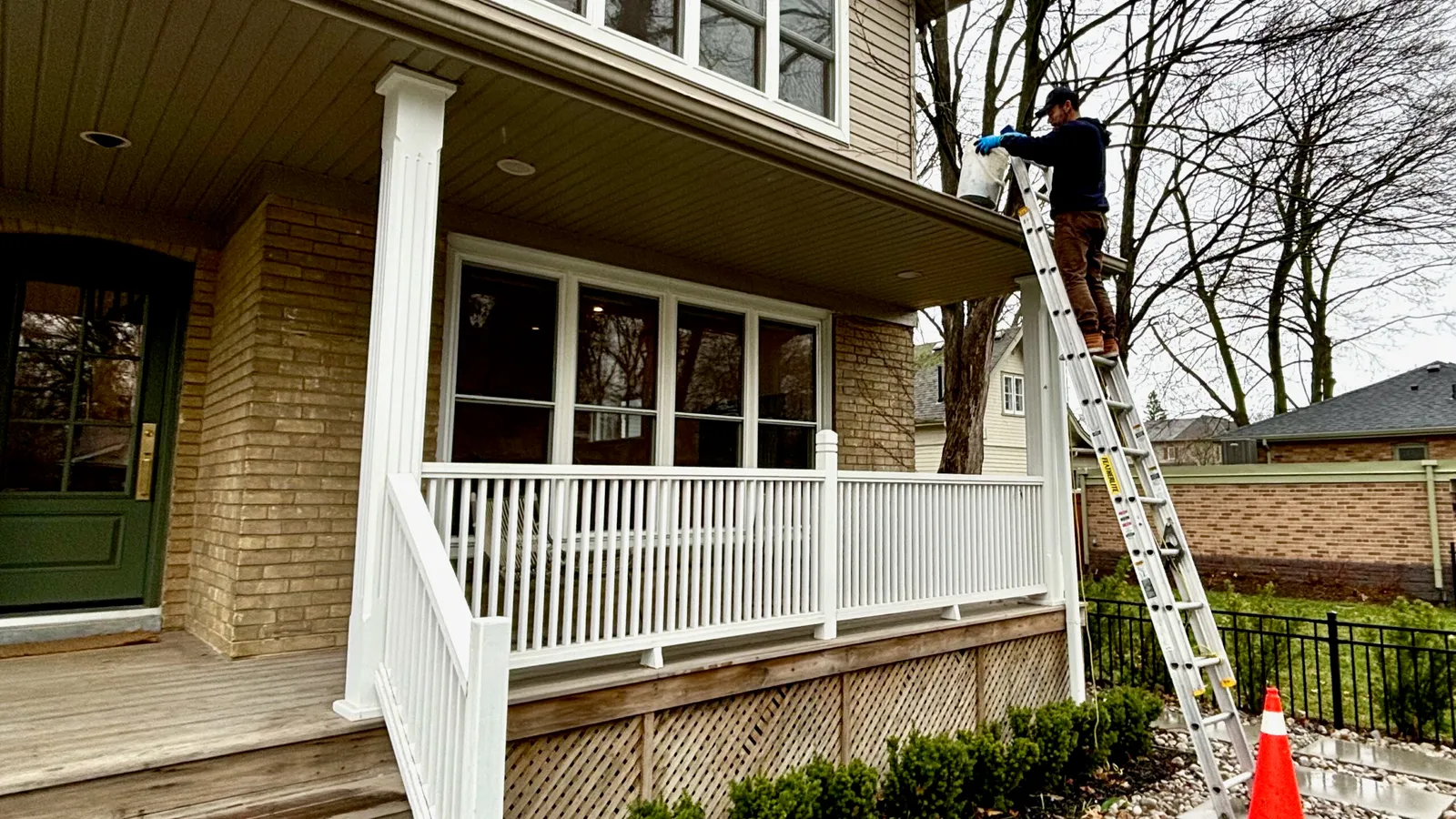 Eavestroughs being cleaned