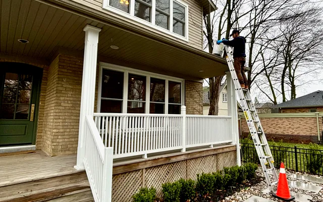 Eavestroughs being cleaned