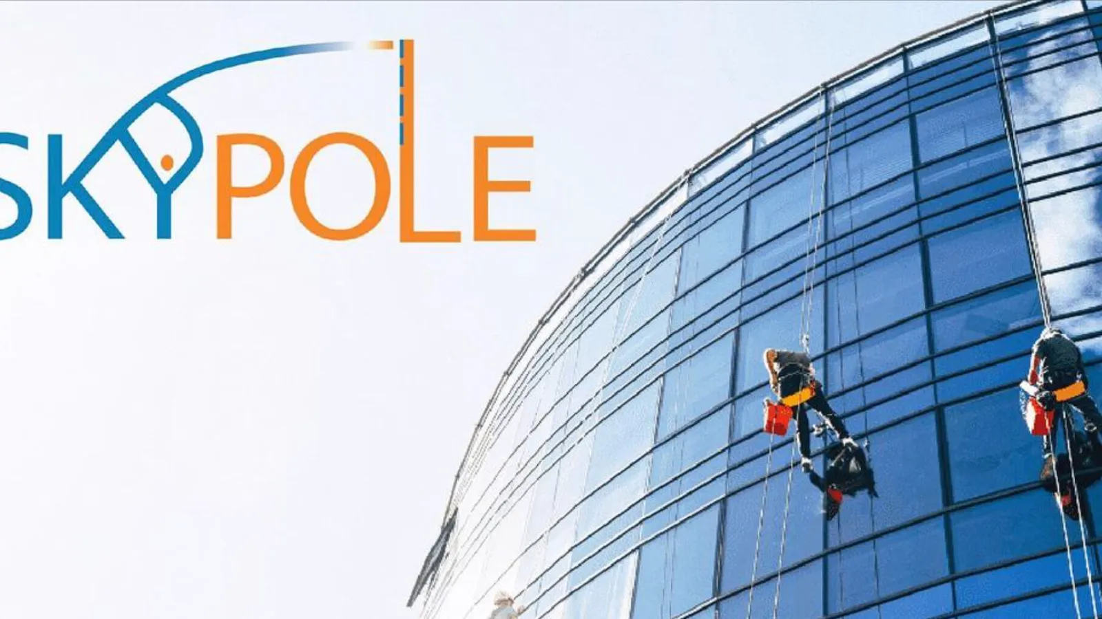 Rope-access window cleaning on a building