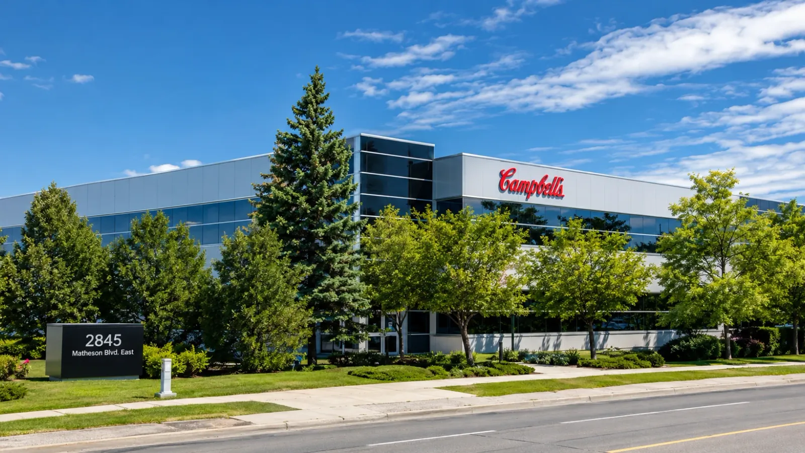Commercial window cleaning at Campbell's Canada headquarters in Mississauga by SKYPOLE, showing a modern office building with spotless exterior glass.