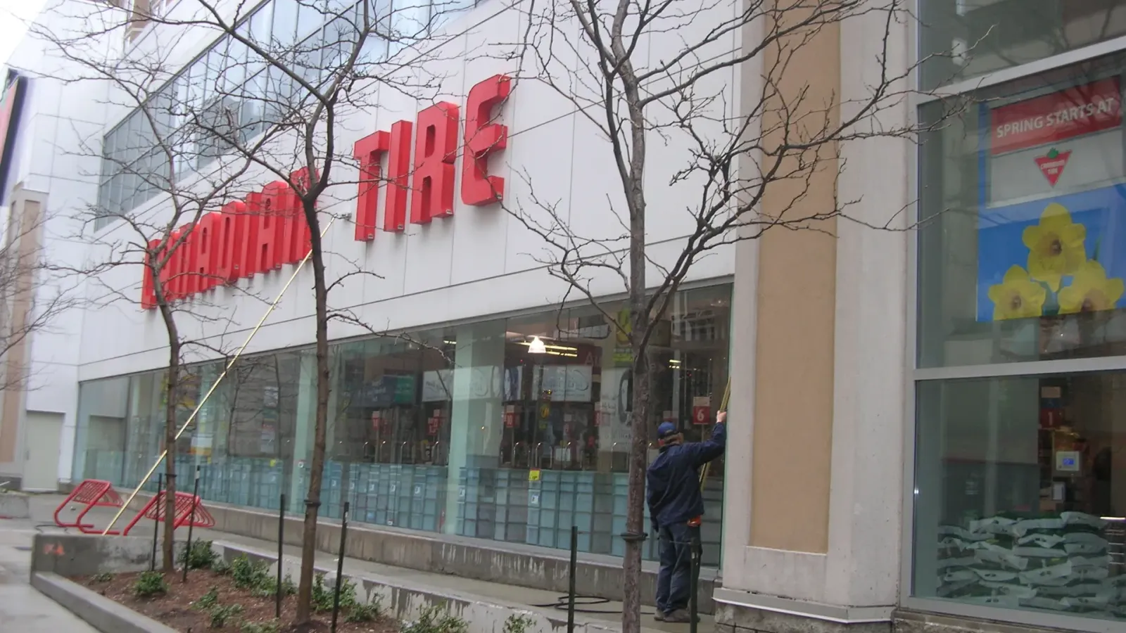 Canadian Tire store exterior on cloudy day.