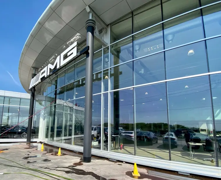 Skypole cleaning a commercial glass facade