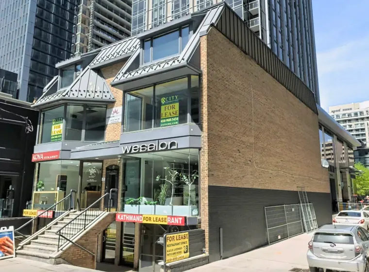 Exterior commercial window cleaning project at 12 Cumberland Street in Yorkville, Toronto