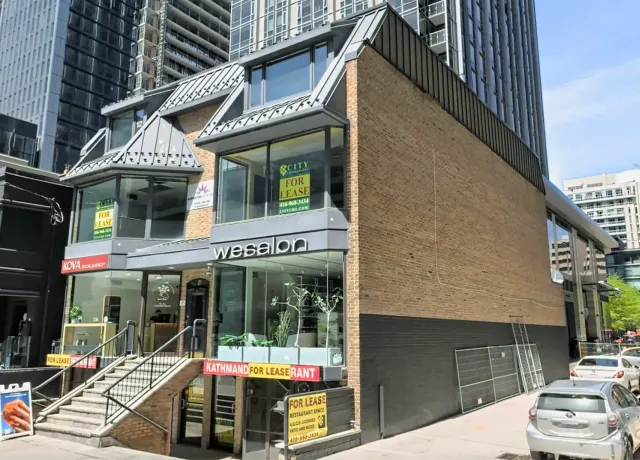 Exterior commercial window cleaning project at 12 Cumberland Street in Yorkville, Toronto