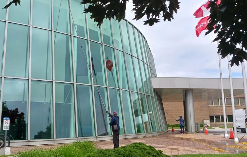 SKYPOLE technicians cleaning the glass façade at Rogers headquarters in Brampton