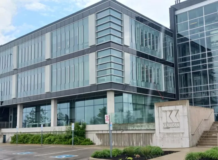 Windows being cleaned on modern office building