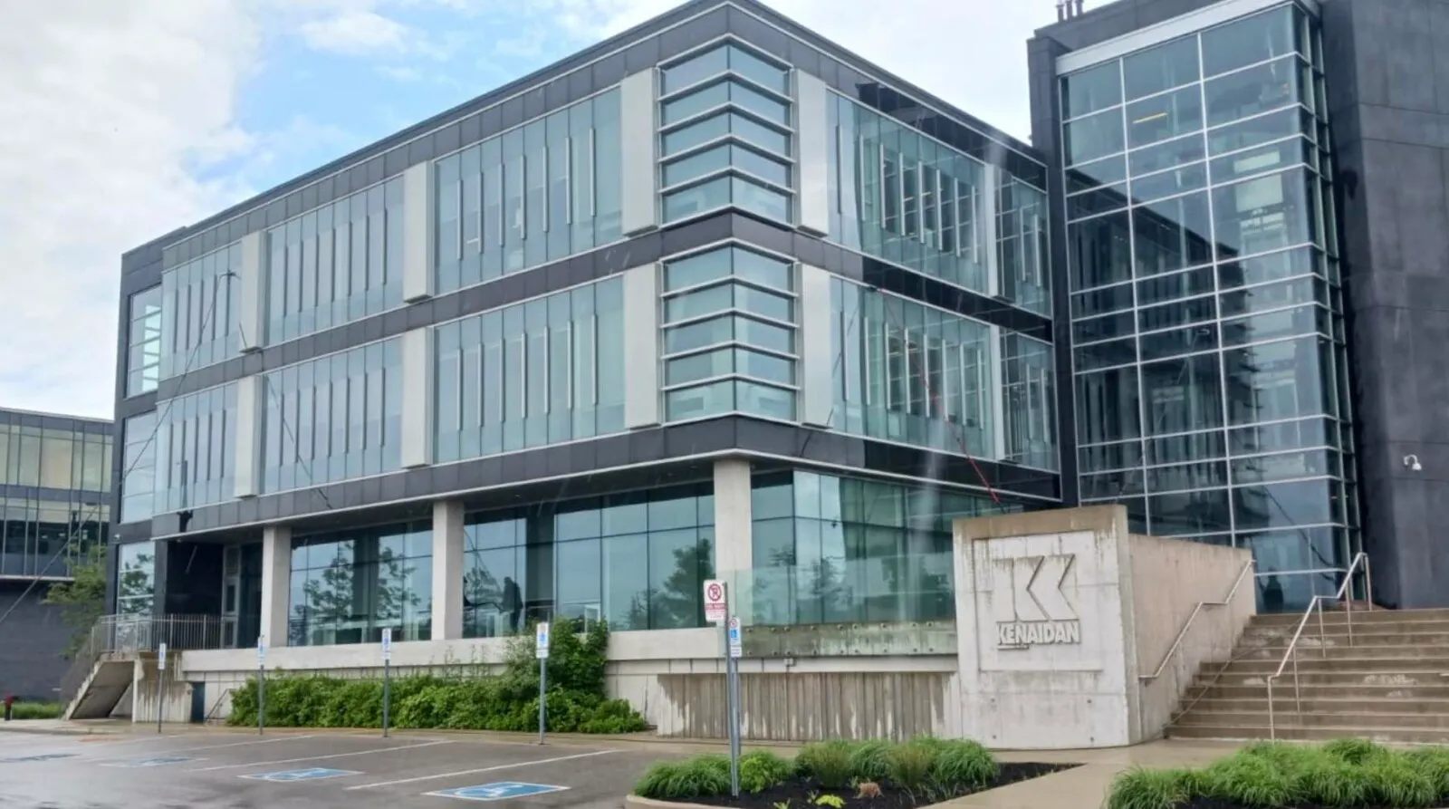 Windows being cleaned on modern office building