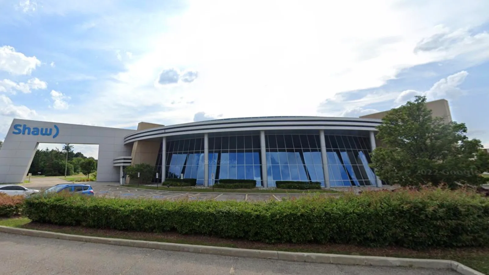 Shaw company modern headquarters building under sunny sky