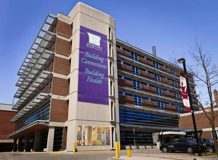 Sherbourne Health Centre with banner on building exterior