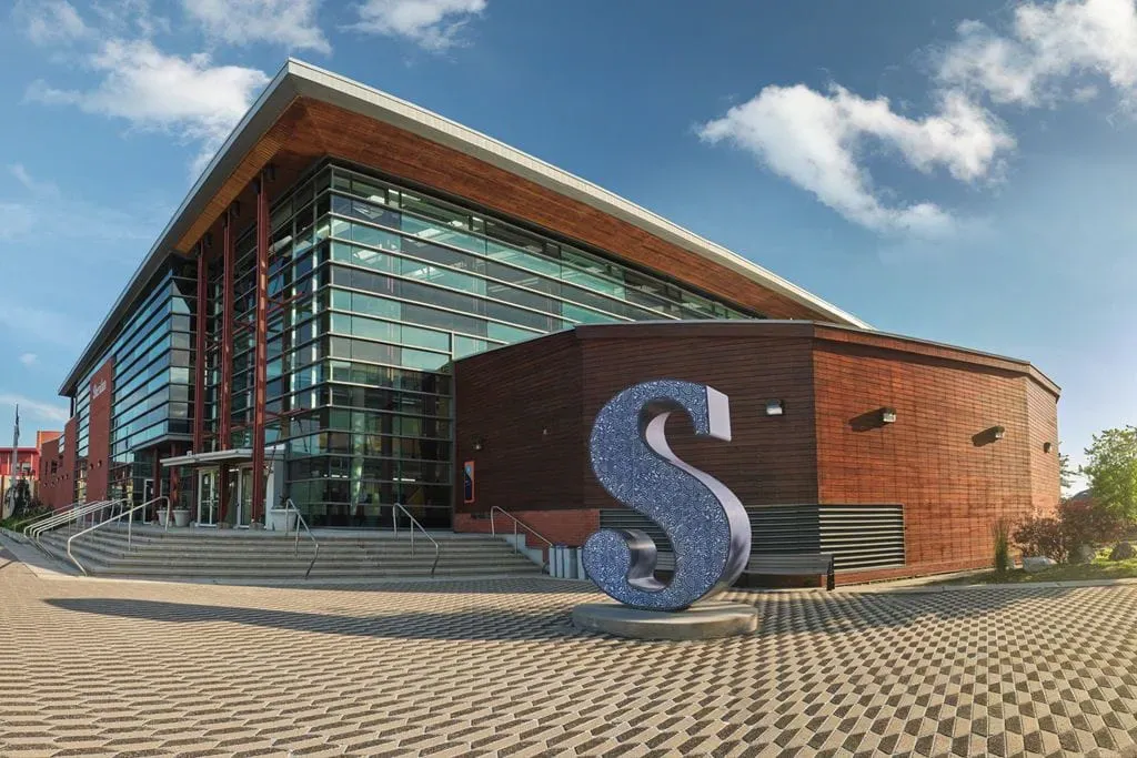 Modern building with large metallic sculpture, Sheridan Trafalgar Campus