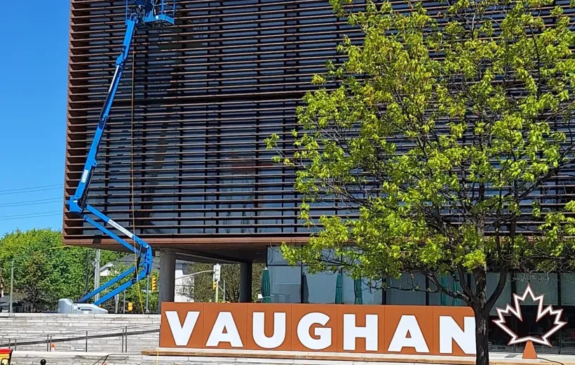 SKYPOLE boom-lift crew cleaning the exterior façade at Vaughan City Hall