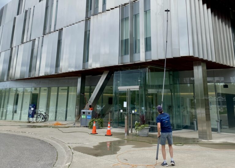 Our skilled Skypole Cleaning team member working on a metallic surface for a gleaming finish.