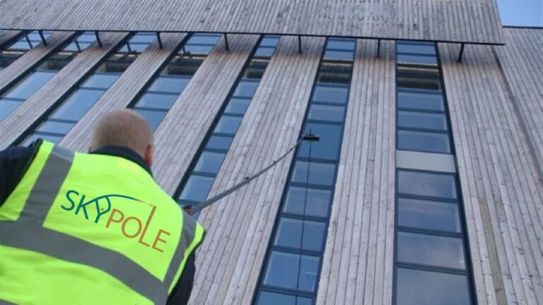 You can see how much safer it is to clean windows from the ground.