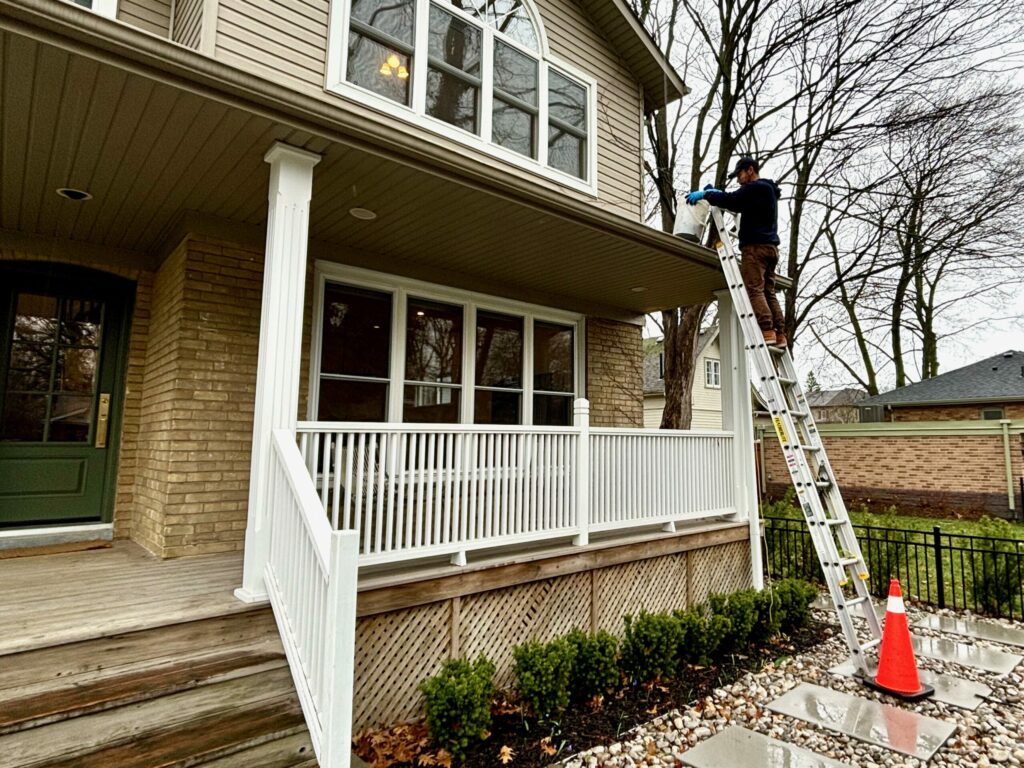 Eavestroughs being cleaned
