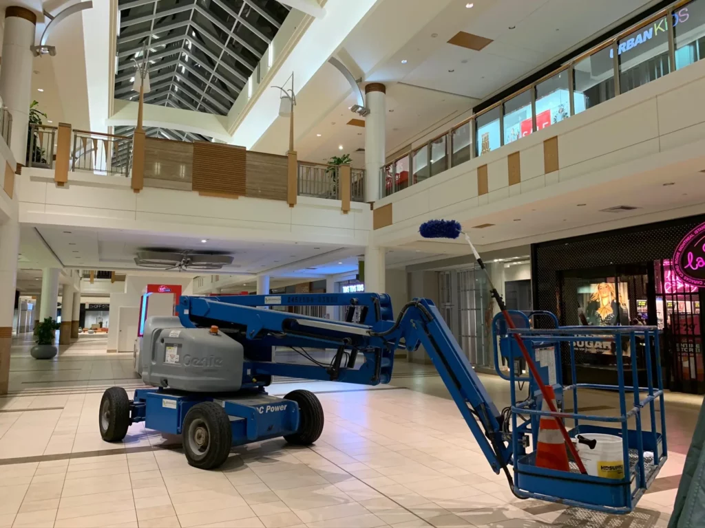 Lift equipment inside a spacious shopping mall.
