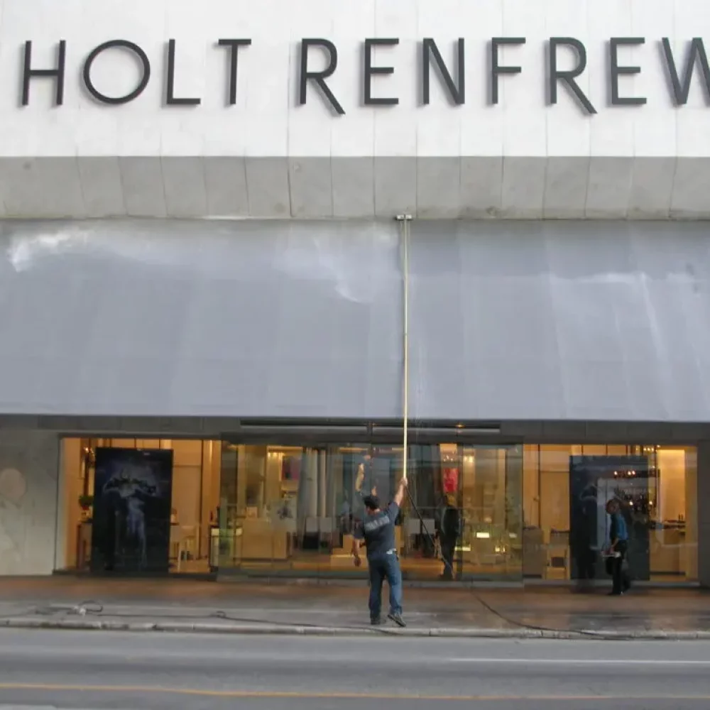 Holt Renfrew store exterior with visible signage and entrances.