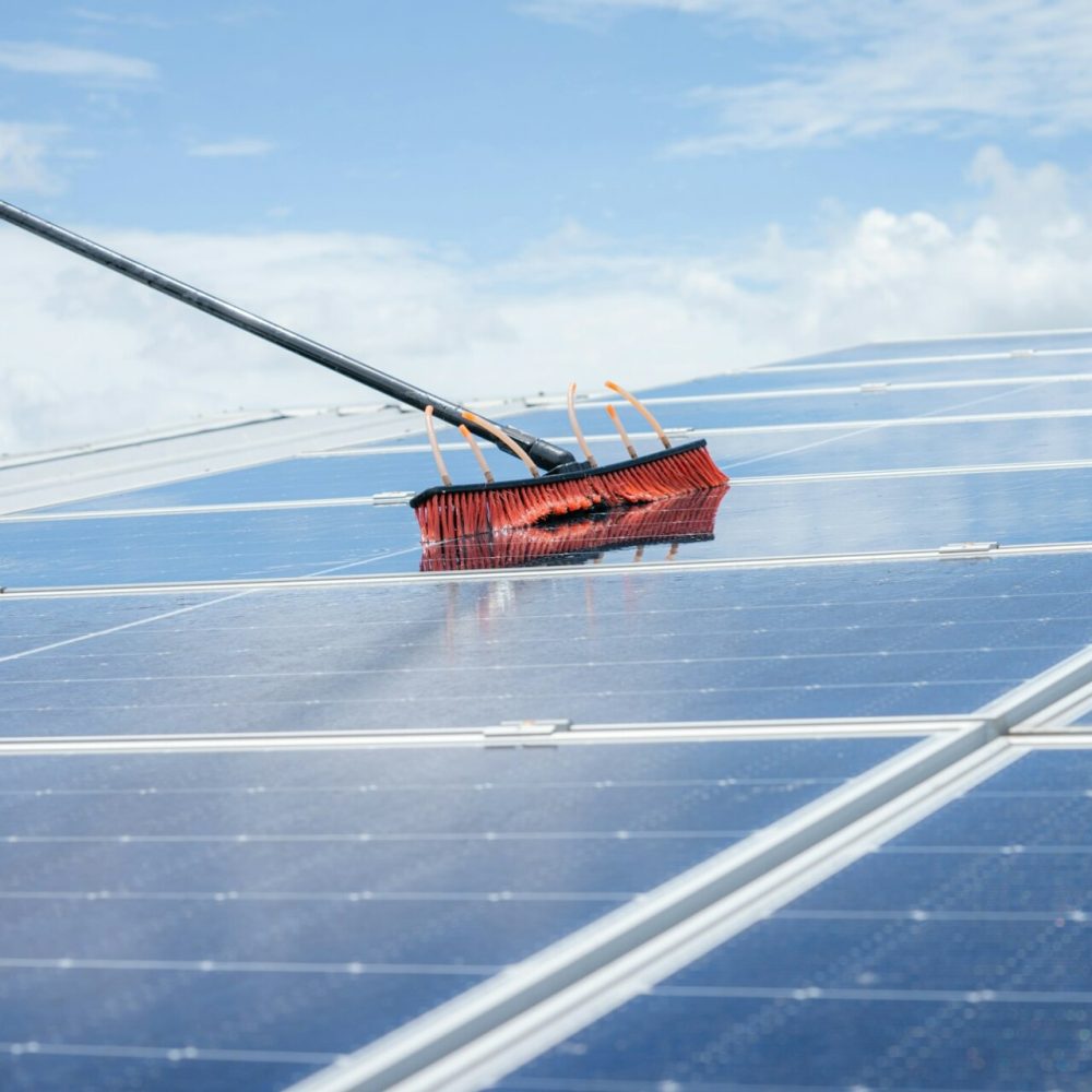 Technicians are cleaning solar panel,Clean solar panel in solar power plant.